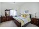 Well-lit main bedroom with coordinated furniture, and comfortable bedding at 23862 W Chambers St, Buckeye, AZ 85326