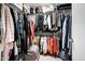 Walk-in closet with organized shelving and hanging space, maximizing storage potential at 23862 W Chambers St, Buckeye, AZ 85326