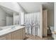 Well lit bathroom with a shower and vanity at 2400 E Baseline Ave # 71, Apache Junction, AZ 85119