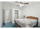View of the bedroom with closet and doorway to the en-suite bathroom at 2400 E Baseline Ave # 71, Apache Junction, AZ 85119
