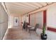 Relaxing covered porch with outdoor seating, perfect for enjoying the weather in this single-story home at 2400 E Baseline Ave # 71, Apache Junction, AZ 85119