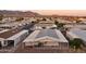This home features solar panels, covered parking, and desert landscaping with views of the mountains at 2400 E Baseline Ave # 71, Apache Junction, AZ 85119