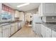 Eat in kitchen with stainless steel appliances and an adjoining dining room at 2400 E Baseline Ave # 71, Apache Junction, AZ 85119