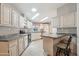 Open kitchen with plentiful countertop space and a skylight provides lots of natural light at 2400 E Baseline Ave # 71, Apache Junction, AZ 85119