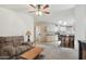 Open-concept living room showcasing a breakfast bar, a view of the kitchen, and comfortable seating at 2400 E Baseline Ave # 71, Apache Junction, AZ 85119