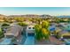 A vibrant community with lush trees nestled beneath the backdrop of majestic mountains at 2533 W Novak Way, Phoenix, AZ 85041