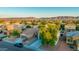 A vibrant community with lush trees nestled beneath the backdrop of majestic mountains at 2533 W Novak Way, Phoenix, AZ 85041