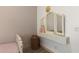 Bright bedroom featuring a vanity with a multi-pane mirror, and light wood style flooring at 2533 W Novak Way, Phoenix, AZ 85041