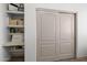Spacious closet with built-in shelving and drawers, alongside a sliding closet door at 2533 W Novak Way, Phoenix, AZ 85041
