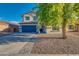 Charming two-story home with desert landscaping, a spacious driveway, and a convenient two-car garage at 2533 W Novak Way, Phoenix, AZ 85041