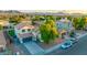 Two-story home featuring desert landscaping, a spacious driveway, and a convenient two-car garage at 2533 W Novak Way, Phoenix, AZ 85041