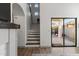 Staircase leading to the second floor with backyard and patio view at 2533 W Novak Way, Phoenix, AZ 85041