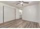 Bedroom featuring wood-look floors, and white walls and door at 2650 W Union Hills Dr # 29, Phoenix, AZ 85027