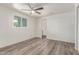 Bright bedroom with modern ceiling fan and neutral tones creating a calming atmosphere at 2650 W Union Hills Dr # 29, Phoenix, AZ 85027