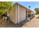 Back of home with an outdoor storage unit and relaxing covered porch area at 2650 W Union Hills Dr # 29, Phoenix, AZ 85027