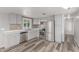 Kitchen showcasing stainless steel appliances and cabinets, complemented by stylish flooring at 2650 W Union Hills Dr # 29, Phoenix, AZ 85027