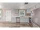 Well-appointed kitchen featuring gray cabinetry, stainless steel appliances, and a decorative backsplash at 2650 W Union Hills Dr # 29, Phoenix, AZ 85027