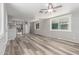 Spacious open-concept living space with a modern kitchen and ample natural light from large windows at 2650 W Union Hills Dr # 29, Phoenix, AZ 85027