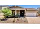 Charming single-story home with a well-manicured front yard and a welcoming entrance at 29403 N 119Th Ln, Peoria, AZ 85383