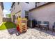 This cozy backyard features a paved patio and an artificial grass area perfect for children to play at 302 N 69Th Pl, Mesa, AZ 85207