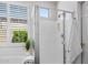 Clean bathroom with walk-in shower, soaking tub, and plantation shutters provides a spa-like retreat at 3336 W Morse Dr, Anthem, AZ 85086
