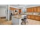 Well-equipped kitchen boasting stainless steel appliances and a central island with barstool seating at 3336 W Morse Dr, Anthem, AZ 85086