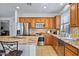 Spacious kitchen with granite countertops, stainless steel appliances, and plenty of natural light at 3336 W Morse Dr, Anthem, AZ 85086