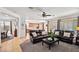 Spacious living room with tile floors offering views of the kitchen and dining area at 3336 W Morse Dr, Anthem, AZ 85086