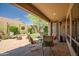 Charming outdoor patio with dining table and chairs, ideal for entertaining or enjoying a relaxing meal at 3336 W Morse Dr, Anthem, AZ 85086