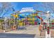 A bright and inviting community playground features colorful structures and ample space for children to explore at 3336 W Morse Dr, Anthem, AZ 85086