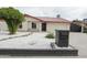 Charming single-story home featuring an updated roof and a low maintenance xeriscaped front yard at 4115 W Sierra St, Phoenix, AZ 85029