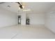 Large garage with epoxy flooring, water heater and room for storage at 4115 W Sierra St, Phoenix, AZ 85029
