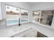 Bright kitchen featuring a view of the pool from the dual basin sink at 4115 W Sierra St, Phoenix, AZ 85029