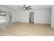 Large open living room with modern laminate floors and easy access to backyard patio at 4115 W Sierra St, Phoenix, AZ 85029