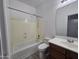 Bathroom featuring tile flooring, vanity with sink, bathtub and shower with a privacy screen at 4255 E Rock Dr, San Tan Valley, AZ 85143