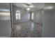 Neutral bedroom with tile floors, ceiling fan, and bright windows at 4255 E Rock Dr, San Tan Valley, AZ 85143
