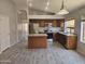 Well-equipped kitchen with stainless steel appliances and a granite-topped island at 4255 E Rock Dr, San Tan Valley, AZ 85143