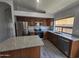 Well-equipped kitchen with stainless steel appliances, granite counters, and a functional island for meal prep at 4255 E Rock Dr, San Tan Valley, AZ 85143