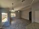 Bright open-concept living space with backyard views and a ceiling fan at 4255 E Rock Dr, San Tan Valley, AZ 85143