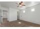 Open bedroom features lots of natural light with carpeted floors at 45080 W Buckhorn Trl, Maricopa, AZ 85139