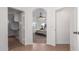 Comfortable bedroom with neutral colors, ceiling fan and large walk-in closet at 45080 W Buckhorn Trl, Maricopa, AZ 85139