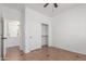 Open bedroom features a closet and door leading to another bedroom at 45080 W Buckhorn Trl, Maricopa, AZ 85139