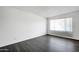 Bedroom featuring modern laminate flooring and window view at 501 E Alameda Dr, Tempe, AZ 85282