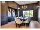 Elegant dining room with a large table and stylish lighting at 6443 E Malcomb Dr, Paradise Valley, AZ 85253