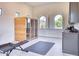 A well-lit workout room featuring a sauna, weight bench, and ample natural light at 6443 E Malcomb Dr, Paradise Valley, AZ 85253