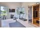 Home gym with a treadmill, weight rack, work out bench, yoga mat, and personal sauna at 6443 E Malcomb Dr, Paradise Valley, AZ 85253