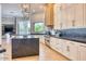 Gourmet kitchen with custom cabinetry, high-end appliances, and a spacious island at 6443 E Malcomb Dr, Paradise Valley, AZ 85253