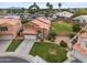 Bird's-eye view of a well-kept home featuring a tile roof, a lawn, and a beautiful front yard at 665 S Balboa --, Mesa, AZ 85206