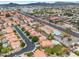 Expansive aerial view of the neighborhood showcasing the home's proximity to amenities at 665 S Balboa --, Mesa, AZ 85206