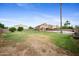 Expansive backyard with a mature landscaping, offering plenty of room for outdoor activities and relaxation at 665 S Balboa --, Mesa, AZ 85206
